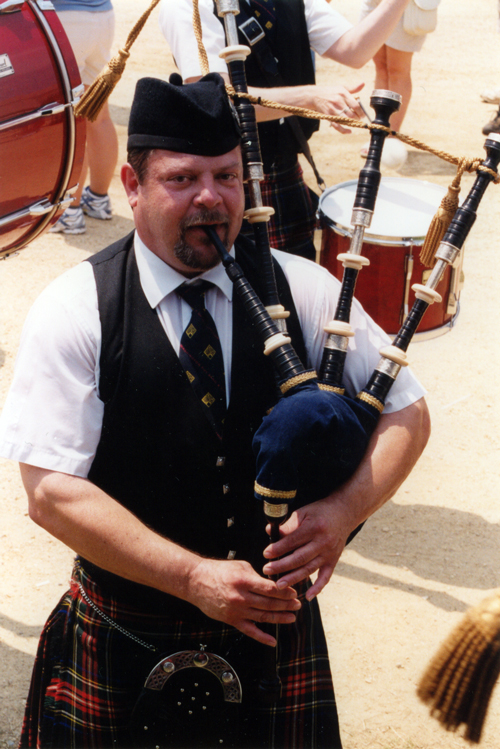 Tim Carey playing the bagpipe